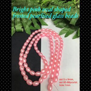 Bright pink oval shaped frosted pearlised glass beads