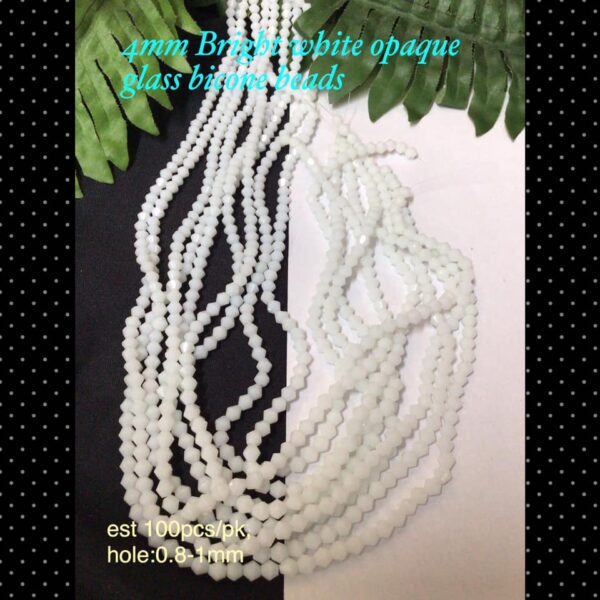 4mm Bright white opaque glass bicone beads (est 100pcs)