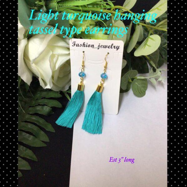 Light Turquoise hanging tassel type earrings