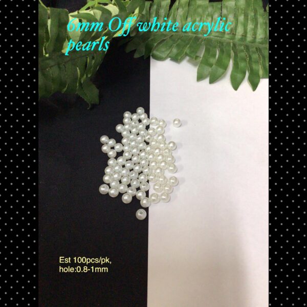 6mm Off white acrylic pearls (est 100pcs)