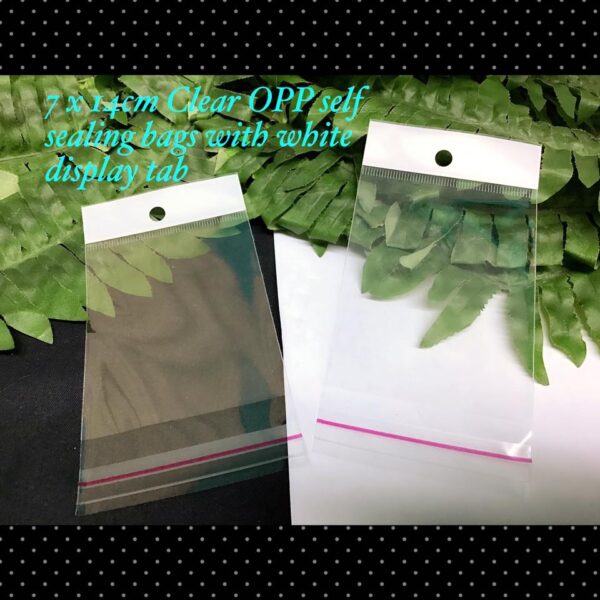 7x14cm Clear OPP self seal bags with white display tab (est 100pcs)