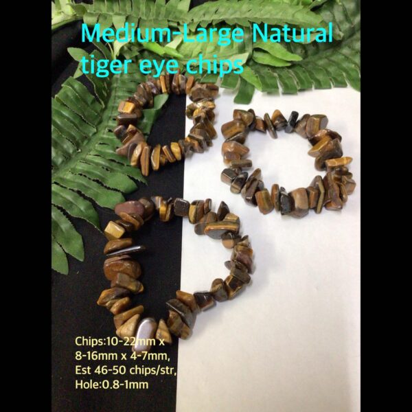 Medium-large Natural tiger eye chips (est 46-50pcs/ strand)