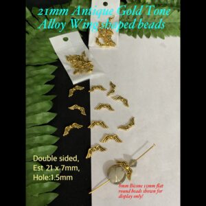21mm Antique Gold Tone Alloy Wing Shaped beads (est 10pcs)